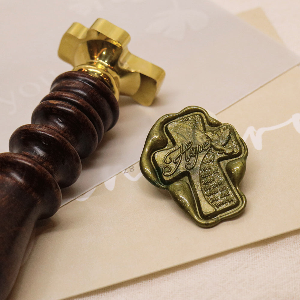 A cross shaped Romans wax seal stamp from AMZ Deco.